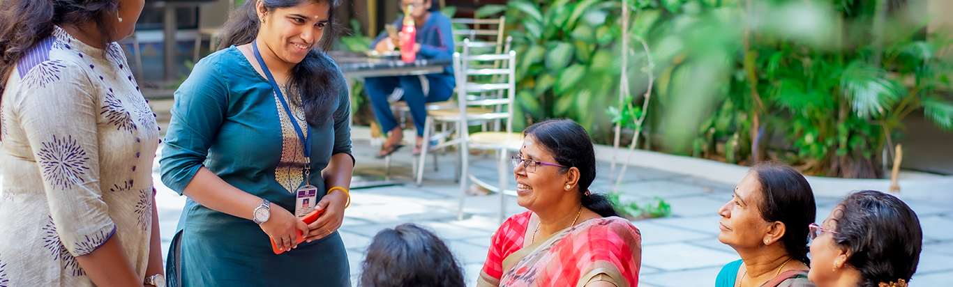 Students and parents talking at hostel campus