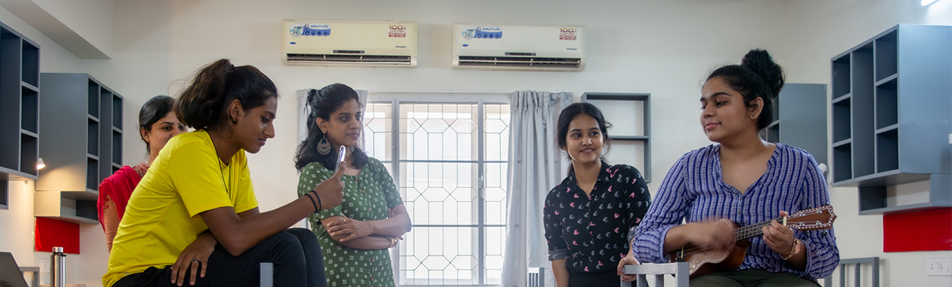 Residents enjoying music inside the hostel