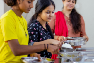 Homely Food Served in Dinning Area facility at Rani Meyyammai Hostel
